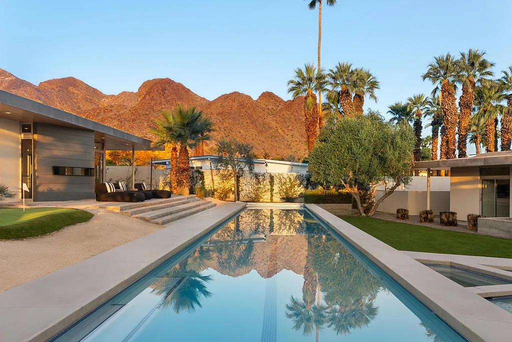 Infinity pool with mountain reflection