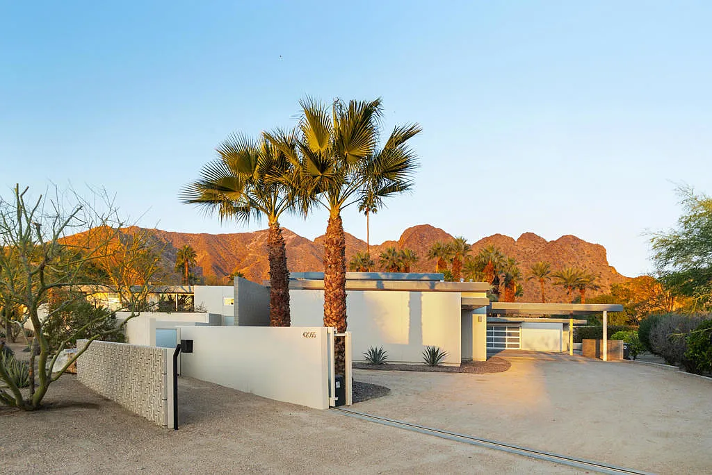 Estate front exterior with mountains